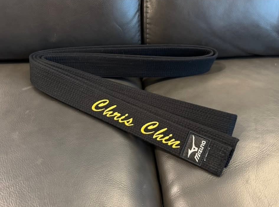 Chris Chin’s black belt embroidered with his name