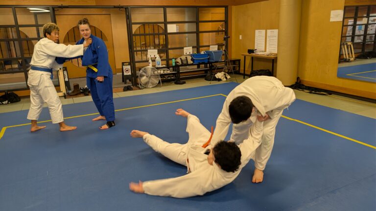 Students practicing a judo throw on the mat at Ishikawa Judo Club, Burnaby BC