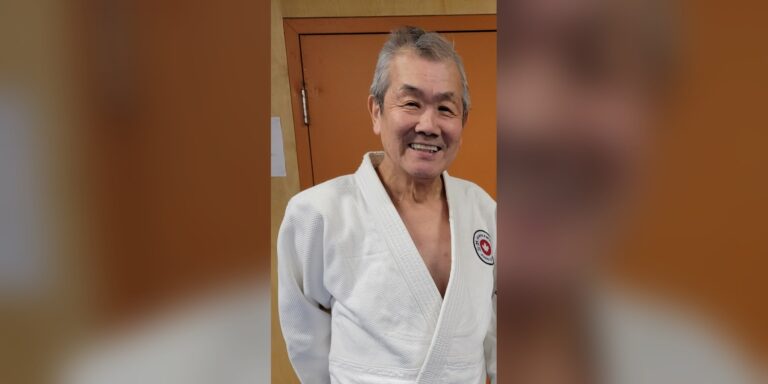 Takao Izumi Sensei smiling in his judo gi